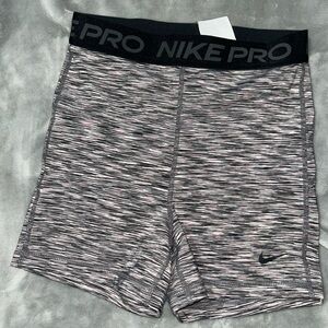 Grey and black nike pro shorts